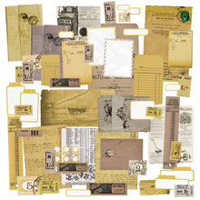 Load image into Gallery viewer, 49 And Market - Ephemera Stackers - Color Swatch: Ochre. These ephemera stackers are an assortment of text weight papers and cardstock pieces and are ideal for layering to create multi dimensional elements on your scrapbooking layouts or in journals. Available at Embellish Away located in Bowmanville Ontario Canada.