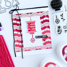 गैलरी व्यूवर में इमेज लोड करें, Catherine Pooler - Background Stamp - Fan Dance. The Fan Dance Background Stamp brings the beauty and lines of decorative fans in motion to your card base. Stamp in any color you chose to create a lovely pattern to your card. Available at Embellish Away located in Bowmanville Ontario Canada. Example by brand ambassador.