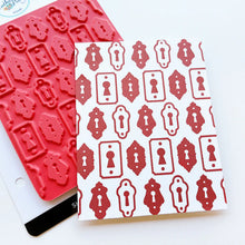 Load image into Gallery viewer, Catherine Pooler - Background Stamp - Lots of Locks. Create a vintage lock background with the Lots of Locks Background Stamp! This repeating pattern will make a great layer for your card inked up in a variety of colors. Available at Embellish Away located in Bowmanville Ontario Canada.