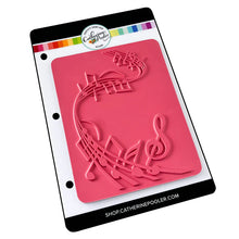 Load image into Gallery viewer, Catherine Pooler - Background Stamp - On Staff. Add some dancing notes to your card background with the On Staff Background Stamp. This red rubber stamp features a winding music staff pattern with notes and musical icons. Available at Embellish Away located in Bowmanville Ontario Canada.