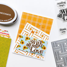 Load image into Gallery viewer, Catherine Pooler - Cover Plate Die - Woven Cover. Add a beautiful natural texture to your card with the Woven Cover Plate Die. The look of basket weave and is beautiful white on white or ink blended with your colors of choice. Available at Embellish Away located in Bowmanville Ontario Canada. Example by brand ambassador.