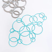 Load image into Gallery viewer, Catherine Pooler - Die - Bubblin'. Your cards and projects will be bubblin' over with fun when you add the Bubblin' Die. This die of connected bubbles will add a fun element to your card background and could also be used to create a stenciled effect. Available at Embellish Away located in Bowmanville Ontario Canada.