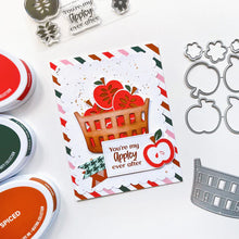 Load image into Gallery viewer, Catherine Pooler - Die - Bushel Basket. Fill up the Bushel Basket Die with some die cut apples from the Appley Ever After Stamp & Die Set. This embossed die cut image makes a farm-style basket that makes a great element to your card and fall projects. Available at Embellish Away located in Bowmanville Ontario Canada. Example by brand ambassador.
