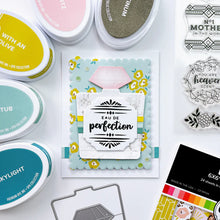 Load image into Gallery viewer, Catherine Pooler - Stamp & Die Set - Heaven Scent Label. This set has sentiments that are Heaven Scent! This 6x8 Stamp Set and coordinating dies were designed to deliver a special sentiment in a the form of an illustrated cosmetic bottle label. Available at Embellish Away located in Bowmanville Ontario Canada. Example by brand ambassador.