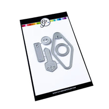 Load image into Gallery viewer, Catherine Pooler - Dies - Suite Motel Key. Create your own Suite Motel Key set with these fun dies. The dies include a key die, tags and "metal" keyring dies for so many fun layering options. Available at Embellish Away located in Bowmanville Ontario Canada.