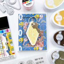 Load image into Gallery viewer, Catherine Pooler - Dies - Suite Motel Key. Create your own Suite Motel Key set with these fun dies. The dies include a key die, tags and "metal" keyring dies for so many fun layering options. Available at Embellish Away located in Bowmanville Ontario Canada. Example by brand ambassador.