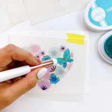 Load image into Gallery viewer, Catherine Pooler - Layered Stencil - Hearts Aflutter. Add color or another medium to main image of the Hearts Aflutter Stamp Set or the Hearts Aflutter Hot Foil Plate with this set of Layered Stencils. Available at Embellish Away located in Bowmanville Ontario Canada. Example by brand ambassador.