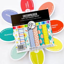 Load image into Gallery viewer, Catherine Pooler - Patterned Paper - Easterpalooza. Let's celebrate the season with the Easterpalooza Patterned Paper. This bright and vibrant pack is full of easter and spring inspired prints and patterns. Available at Embellish Away located in Bowmanville Ontario Canada.
