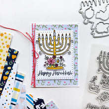 Load image into Gallery viewer, Catherine Pooler - Patterned Paper - Eight Nights. Create gorgeous Hanukkah cards and paper projects with the Eight Nights Patterned Paper. Traditional colors of Whipped Honey, Shea Butter, Sauna, Tranquil, On the Lake, Juniper Mist, Rose Petals & Sage. Available at Embellish Away located in Bowmanville Ontario Canada. Example by brand ambassador.