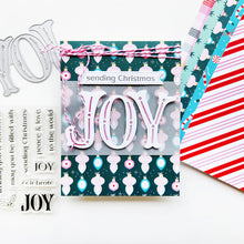 Load image into Gallery viewer, Catherine Pooler - Sentiment Stamps - Holiday Joy. Designed to pair beautifully with the Festive Joy Word Die, it’s ideal for sending peace, love, and joy this season. Make your festive messages shine with this essential sentiment set! Available at Embellish Away located in Bowmanville Ontario Canada. Example by Catherine Pooler Designs.