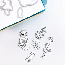 Load image into Gallery viewer, Catherine Pooler - Stamp & Die Set - Ahoy Matey. Get ready for a swashbuckling good time in your crafty space! The Ahoy Matey Stamp Set and its coordinating dies includes a cast of the cutest North East Coast fisherman you have ever seen! Available at Embellish Away located in Bowmanville Ontario Canada.