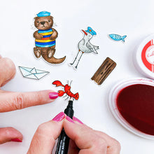 Load image into Gallery viewer, Catherine Pooler - Stamp & Die Set - Ahoy Matey. Get ready for a swashbuckling good time in your crafty space! The Ahoy Matey Stamp Set and its coordinating dies includes a cast of the cutest North East Coast fisherman you have ever seen! Available at Embellish Away located in Bowmanville Ontario Canada.