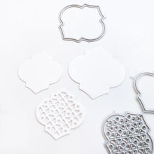 Load image into Gallery viewer, Catherine Pooler - Stamp & Die Set - Arabesque Pieces. This Set has patterned shapes for creating backgrounds and beautiful embellishments. The included sentiments of Love you more and Keep smiling are just the extra little touch your cards will need. Available at Embellish Away located in Bowmanville Ontario Canada