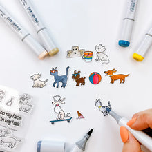 Load image into Gallery viewer, Catherine Pooler - Stamp & Die Set - Boardwalk Cruisers. These perky pal cats and dogs love some fun. This stamp set includes pets that are ready to roll on their skateboard or longboard, play in the sand or eat your dropped ice cream cone! Available at Embellish Away located in Bowmanville Ontario Canada.
