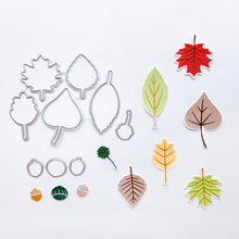 Cargar imagen en el visor de la galería, Catherine Pooler - Stamp & Die Set - Changing Leaves. Perfect mid-sized leaves for all your cards and scrapbook pages. Includes 5 solid stamp leaves with separate vein and stem stamps. Includes an acorn, gumball and chestnut to add to your fall card. Available at Embellish Away located in Bowmanville Ontario Canada.