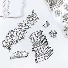 Load image into Gallery viewer, Catherine Pooler - Stamp & Die Set - Floral Fiction. The Floral Fiction Set is full of fun background and decorative elements for birthday, graduation or just because cards Pair these book and flowers with the Owls from the Who's Hoo set. Available at Embellish Away located in Bowmanville Ontario Canada.