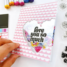 Load image into Gallery viewer, Catherine Pooler - Stamp & Die Set - Hearts Aflutter. Set someone's heart aflutter with this beautiful stamp set and coordinating dies! The Hearts Aflutter Stamps features a large, line-art heart made of flowers and a butterfly. Available at Embellish Away located in Bowmanville Ontario Canada Example by brand ambassador.