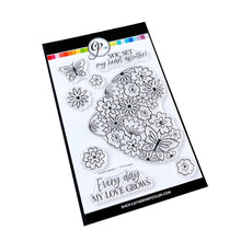 Load image into Gallery viewer, Catherine Pooler - Stamp & Die Set - Hearts Aflutter. Set someone's heart aflutter with this beautiful stamp set and coordinating dies! The Hearts Aflutter Stamps features a large, line-art heart made of flowers and a butterfly. Available at Embellish Away located in Bowmanville Ontario Canada