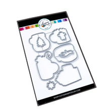 Load image into Gallery viewer, Catherine Pooler - Stamp & Die Set - Holiday Mug. From the makers of the original Mug Shots Stamp Set comes Holiday Mug Shots Stamps and coordinating dies! Features all your favorite winter friends- Santa, Rudolf, Snowman and even the Gingerbread man. Available at Embellish Away located in Bowmanville Ontario Canada.