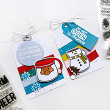 Load image into Gallery viewer, Catherine Pooler - Stamp & Die Set - Holiday Mug. From the makers of the original Mug Shots Stamp Set comes Holiday Mug Shots Stamps and coordinating dies! Features all your favorite winter friends- Santa, Rudolf, Snowman and even the Gingerbread man. Available at Embellish Away located in Bowmanville Ontario Canada. Example by brand ambassador.