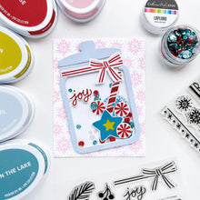 Load image into Gallery viewer, Catherine Pooler - Stamp & Die Set - Jar Full of Joy. Fill your holiday cookie jar with joy! Use the Jar Full of Joy Stamp Set and Coordinating Dies to create your own holiday decor cards! Fill the jar or turn it into a shaker card. Available at Embellish Away located in Bowmanville Ontario Canada. Example by brand ambassador.