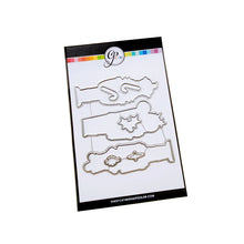 Load image into Gallery viewer, Catherine Pooler - Stamp & Die Set - Nutcracker Sweet. Meet the cutest nutcrackers in town! This whimsical set features charming nutcrackers adorned in a delightful array of sweets and treats, including cupcakes, candy canes, and figgy pudding. Available at Embellish Away located in Bowmanville Ontario Canada.