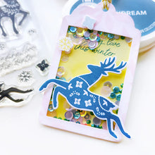 Load image into Gallery viewer, Catherine Pooler - Stamp & Die Set - Peaceful Deer. Create elegant, winter-themed cards. Available at Embellish Away located in Bowmanville Ontario Canada. Example by Catherine Pooler Designs.