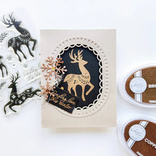 Load image into Gallery viewer, Catherine Pooler - Stamp & Die Set - Peaceful Deer. Create elegant, winter-themed cards. Available at Embellish Away located in Bowmanville Ontario Canada. Example by Catherine Pooler Designs.