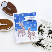 Load image into Gallery viewer, Catherine Pooler - Stamp & Die Set - Peaceful Deer. Create elegant, winter-themed cards. Available at Embellish Away located in Bowmanville Ontario Canada. Example by Catherine Pooler Designs.
