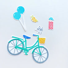 Load image into Gallery viewer, Catherine Pooler - Stamp & Die Set - Pedaling By. Featuring a birthday bike with tons of fun decorations. Decorate with the gifts, balloons and bunting. There's also a basket that can be filled with flowers or a kitty to take along or the ride! Available at Embellish Away located in Bowmanville Ontario Canada.