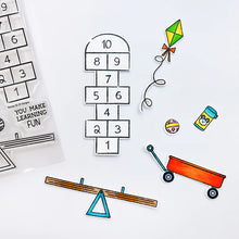 Load image into Gallery viewer, Catherine Pooler - Stamp & Die Set - Recess. It's time for everybody's favorite subject-Recess! Grab the Recess Stamp Set and coordinating dies with all the essentials of nostalgic playground games like see-saw and hop scotch. Available at Embellish Away located in Bowmanville Ontario Canada.