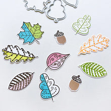 Load image into Gallery viewer, Catherine Pooler - Stamp & Die Set - Stamp-a-Side Leaves. You will certainly fall for the Stamp-a-Side Leaves Stamp & Die Set. You can stamp the whimsical patterned leaves with multiple ink colors or color the outline image with markers or blender pens. Available at Embellish Away located in Bowmanville Ontario Canada.