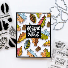 Load image into Gallery viewer, Catherine Pooler - Stamp & Die Set - Stamp-a-Side Leaves. You will certainly fall for the Stamp-a-Side Leaves Stamp & Die Set. You can stamp the whimsical patterned leaves with multiple ink colors or color the outline image with markers or blender pens. Available at Embellish Away located in Bowmanville Ontario Canada. Example by brand ambassador.