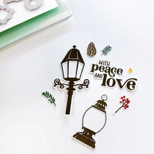 Load image into Gallery viewer, Catherine Pooler - Stamp & Die Set - Warm & Bright. Light glowing works of art, lamps and lanterns are a classic icon of warmth and home. Features these images with candles and greenery to "decorate" them for the winter season. Available at Embellish Away located in Bowmanville Ontario Canada.