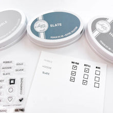 Load image into Gallery viewer, Catherine Pooler - Stamps - 2023 Colors. Label your swatches and get organized with the 2023 Colors Stamp Set. This set includes each of the new colors released in 2023 as an individual stamp. There is also a fun flower, star and other check boxes that you can use for cute labeling options. Available at Embellish Away located in Bowmanville Ontario Canada.