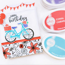 Load image into Gallery viewer, Catherine Pooler - Stamp & Die Set - Pedaling By. Featuring a birthday bike with tons of fun decorations. Decorate with the gifts, balloons and bunting. There's also a basket that can be filled with flowers or a kitty to take along or the ride! Available at Embellish Away located in Bowmanville Ontario Canada. Example by Catherine Pooler Designs.