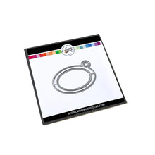 Load image into Gallery viewer, Catherine Pooler - Tag Die - Ink Swatch. Make your own colorful swatch ring. Die cut and direct to paper your center oval. Glue them to the die cut tag bases and tie them together with a piece of twine or us a binder ring for easy access. Available at Embellish Away located in Bowmanville Ontario Canada.