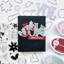 Load image into Gallery viewer, Catherine Pooler - Word Die - Festive Joy. Celebrate the season with the Festive Joy Word Die! This beautiful large "JOY" die can serve as the focal point of your holiday cards, adding a bold and cheerful touch. Available at Embellish Away located in Bowmanville Ontario Canada. Example by Catherine Pooler Designs.