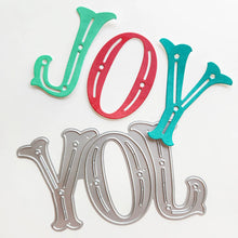 Load image into Gallery viewer, Catherine Pooler - Word Die - Festive Joy. Celebrate the season with the Festive Joy Word Die! This beautiful large "JOY" die can serve as the focal point of your holiday cards, adding a bold and cheerful touch. Available at Embellish Away located in Bowmanville Ontario Canada.