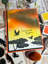 Load image into Gallery viewer, Gina K. Designs - Stamp - Serene Skies. Melanie Muenchinger has created some perfect silhouettes, powerlines and barbed wire fences to complement your blended ink backgrounds. This set is made of premium clear photopolymer and measures 6" X 8". Available at Embellish Away located in Bowmanville Ontario Canada. Example by Melanie Muenchinger.