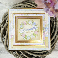 Load image into Gallery viewer, Hunkydory - A4 Deluxe Craft Pads - Forever Florals Hydrangea. Each Pad comes with 4 different topper sets which each include their own foiled and die-cut topper sheet, foiled cardstock, printed cardstock and 2 matching inserts. Available at Embellish Away located in Bowmanville Ontario Canada.