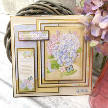 Load image into Gallery viewer, Hunkydory - A4 Deluxe Craft Pads - Forever Florals Hydrangea. Each Pad comes with 4 different topper sets which each include their own foiled and die-cut topper sheet, foiled cardstock, printed cardstock and 2 matching inserts. Available at Embellish Away located in Bowmanville Ontario Canada.