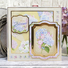 Load image into Gallery viewer, Hunkydory - A4 Deluxe Craft Pads - Forever Florals Hydrangea. Each Pad comes with 4 different topper sets which each include their own foiled and die-cut topper sheet, foiled cardstock, printed cardstock and 2 matching inserts. Available at Embellish Away located in Bowmanville Ontario Canada.