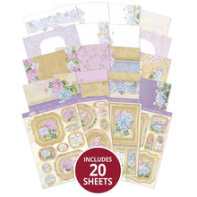 Load image into Gallery viewer, Hunkydory - A4 Deluxe Craft Pads - Forever Florals Hydrangea. Each Pad comes with 4 different topper sets which each include their own foiled and die-cut topper sheet, foiled cardstock, printed cardstock and 2 matching inserts. Available at Embellish Away located in Bowmanville Ontario Canada.