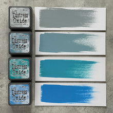 Load image into Gallery viewer, Ranger - Tim Holtz - Distress Mini Oxide Ink Pads Kit, #4 (4pc). Colours: Weathered Wood, Stormy Sky, Peacock Feathers and Salty Ocean. Available at Embellish Away in Bowmanville Ontario Canada.