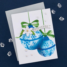 Cargar imagen en el visor de la galería, Spellbinders - Stencil By Bibi Cameron Snowflakes - Snowflake Ornaments. Snowflake Ornaments Stencil is part of the Bibi's Snowflakes Collection by Bibi Cameron and comes in a set of two 6 x 9-inch layering stencils and two masks. Available at Embellish Away located in Bowmanville Ontario Canada. Example by brand ambassador.