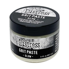 Load image into Gallery viewer, Tim Holtz - Distress Grit Paste - 3oz - Glow. Tim Holtz Distress Mixed Media Medium Grit Paste - Glow is a texture paste that glows in the dark when exposed to the sun or UV light. It adds a glow effect to spooky projects of all kinds. Available at Embellish Away located in Bowmanville Ontario Canada.