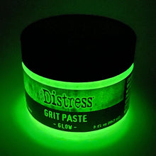 Load image into Gallery viewer, Tim Holtz - Distress Grit Paste - 3oz - Glow. Tim Holtz Distress Mixed Media Medium Grit Paste - Glow is a texture paste that glows in the dark when exposed to the sun or UV light. It adds a glow effect to spooky projects of all kinds. Available at Embellish Away located in Bowmanville Ontario Canada.