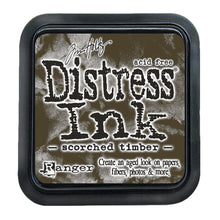 Load image into Gallery viewer, Tim Holtz - Distress Ink Pad - Large. Create an aged look on papers, fibers, photos and more! This package contains one 2-1/4x2-1/4 inch ink pad. Comes in a variety of distressed colors. Each sold separately. Scorched Timber. Available at Embellish Away located in Bowmanville Ontario Canada.