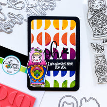 Load image into Gallery viewer, Catherine Pooler - Die Set - We Fit. Remind your friends and loved ones they "just fit" by sending cards made with the We Fit Dies and coordinating We Fit Stamps. Use the dies to cut out one of the three dolls, the cat doll or one of the extras. Layer the pieces to create dimension and fun on all your friendly cards. Available at Embellish Away located in Bowmanville Ontario Canada. Card example by brand ambassador.